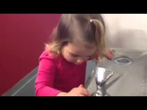 Little Girl and drinking fountain
