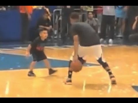 Stephen Curry Playing with Young Fan